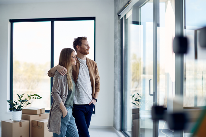 Couple looking at their house